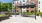 a building with a courtyard and trees