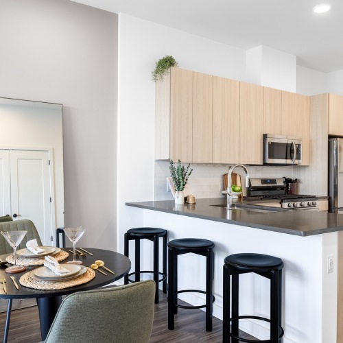 Open concept living makes entertaining a breeze view of the dining, island and kitchen