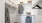 closet with organizers and clothes hanging