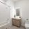 a bathroom with a tub toilet and sink