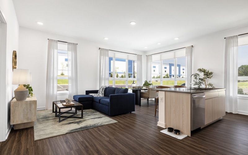 a living room with large windows
