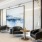 a room with a large wood paneled wall and chairs