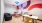 play room with tables and chairs and colorful mural