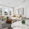 A spacious living and dining area in a modern apartment, featuring large windows, neutral-toned furniture, and stylish decor with pops of yellow.