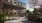 a building with a courtyard and trees